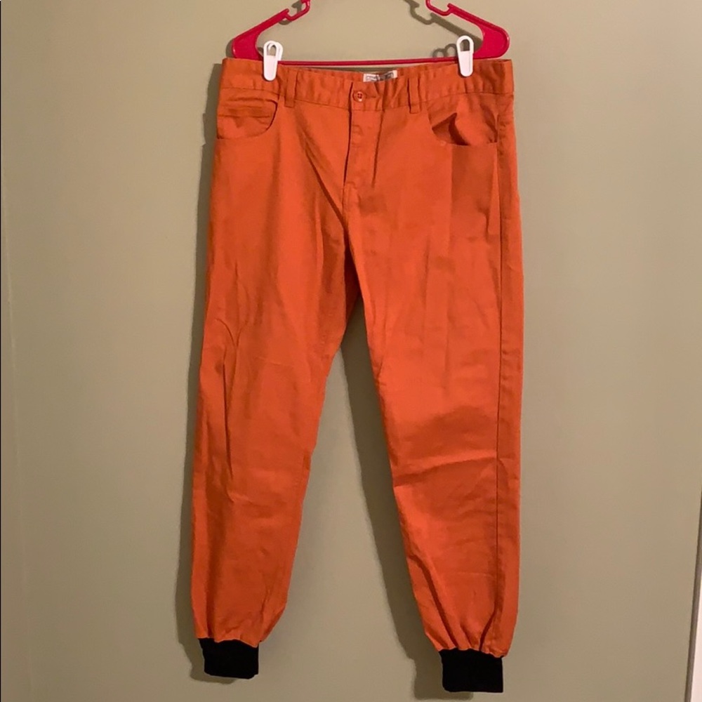 Orange joggers L